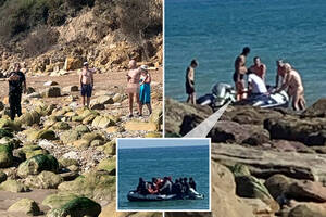 naturist beach videos - Boat full of migrants lands on nudist beach - and naked sunbathers offer  them hot drinks | The US Sun